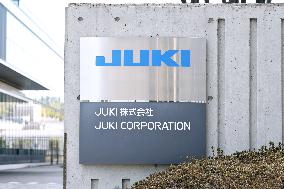 JUKI signboard and logo